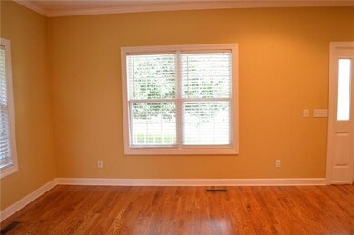 16x11 dining room with access to the back covered porch.