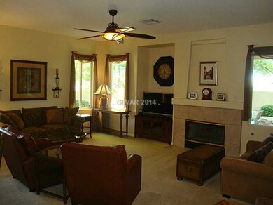 Den. Spacious great room with media niche, gas fir