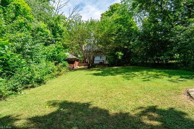 View of yard from back looking to home