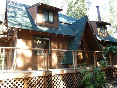 The deck wraps around the front and side