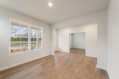 Empty room with light wood-style flooring, recesse