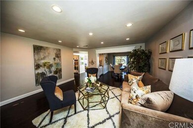 Spacious open living room flowing into the dining 