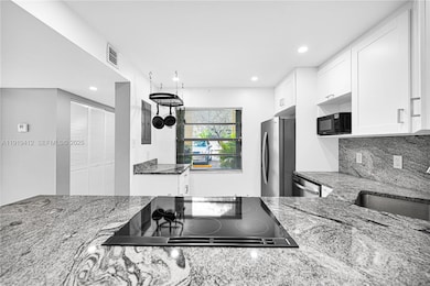 132 S Cypress Rd unit 518, Pompano Beach, FL 33060 - photo 6