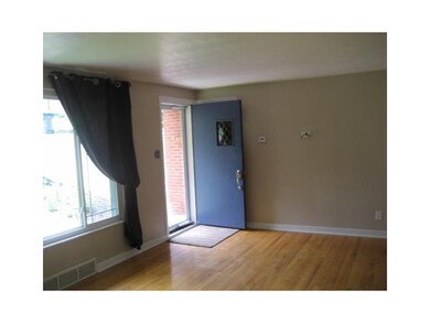 Living Room. Good size living room with hardwood f