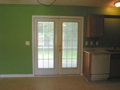 French doors from eatin kitchen to patio
