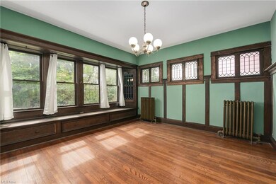 The dining room is large and bright with plenty of windows.