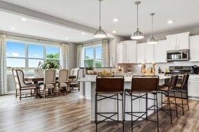This unbelievable main level is the true definitionof open floor plan. Photos don't capture the true size of this space. Photos are of a decorated model home and finishes will vary.