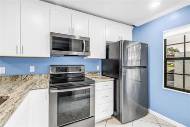 9224 Mission Oaks Blvd unit 27B, Seminole, FL 33776 - photo 7