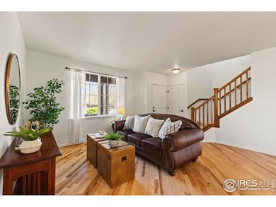 Bright and beautiful formal living and dinning area.  Rich hickory hardwood floors through out the main floor.