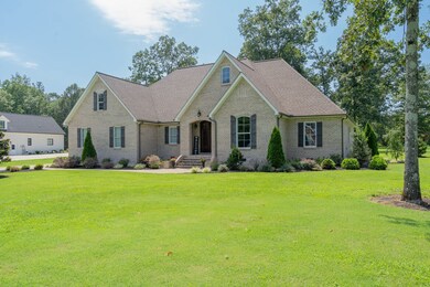 Located in the peaceful and charming community of Woodland Estates, a sought after neighborhood characterized by spacious lawns and convenience to all things Lawrenceburg.