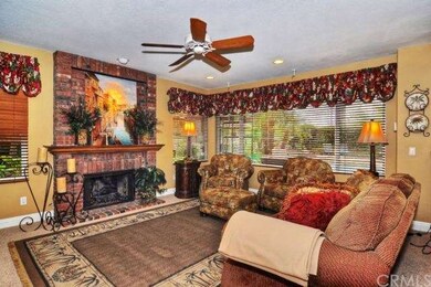 Conveniently located just off the open kitchen, th