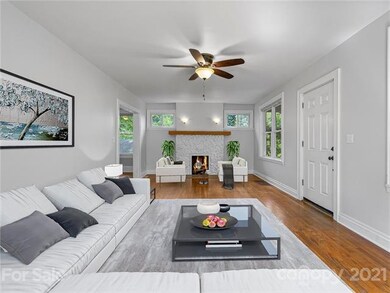 Spacious living area with gas fireplace.