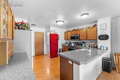 Kitchen with appliances with stainless steel finis
