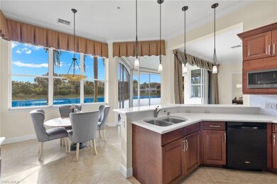Kitchen featuring stainless steel microwave, dishw