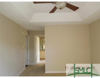 Master Bedroom. View of the Master Bedroom toward 