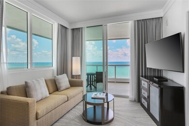 Living room  with sleeper sofa and ocean views