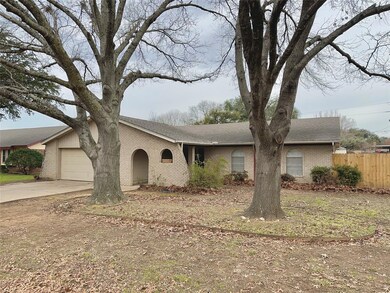 Single story home with a garage