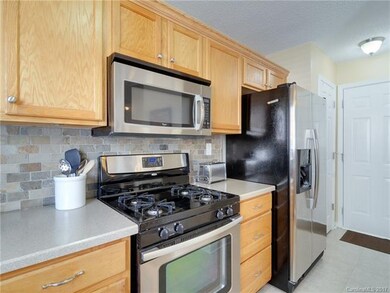 Corian counters, tile back splash and crown moldin