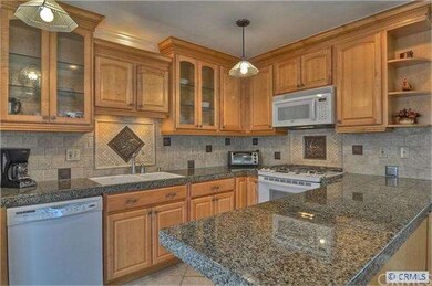 What A Great Kitchen!  Features Marble Back Splash