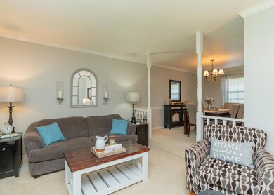 Living room open to dining room