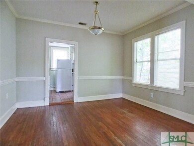 Separate Dining Room with Wood Floors and NEW Pain