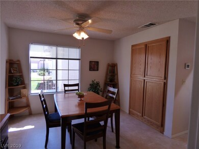 Cheery Dining Nook.  Deep pantry.