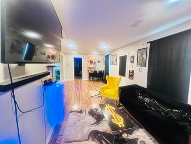 Living room featuring hardwood / wood-style floors