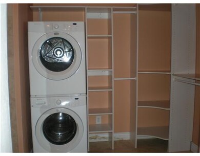 Laundry Room. Full size stackable washer & dryer a