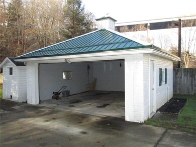 Another view of the garage with the door open.  Br