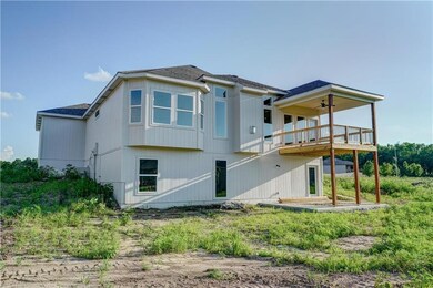 Covered deck located off kitchen.  Basement is a w