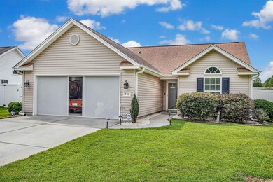 Single story home featuring a front yard