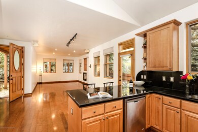 304SummersetLn_kitchen toward dining and
