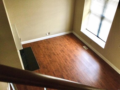 Two story greatroom with fireplace and low mainten