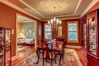 Formal living and dining rooms with extensive mold