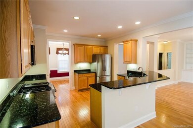 Stone countertops and Viking appliance suite make 