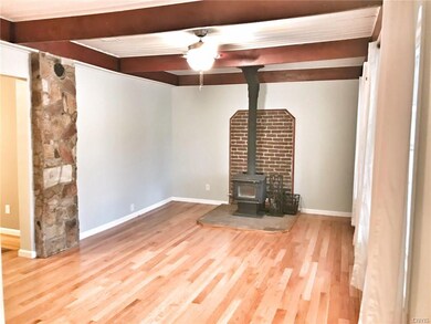 Beautiful family room with hardwood floors and new