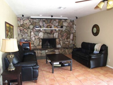 Family Room with Wood Fireplace