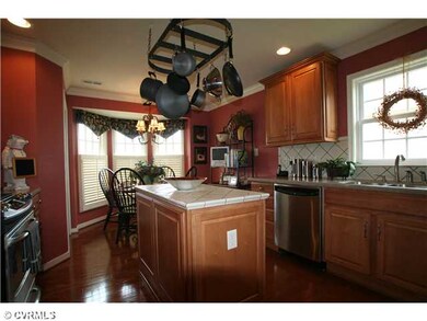 Kitchen - Bay window, wood floors, upgraded cabine