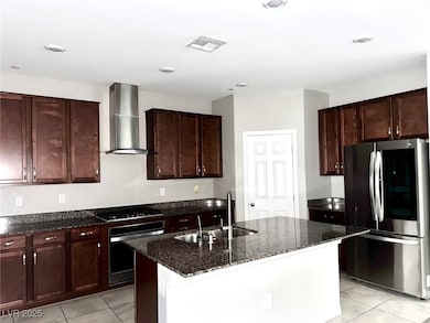 Kitchen with oven, a sink, smart refrigerator, bla