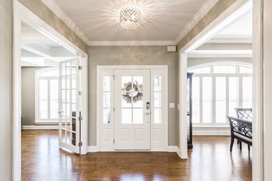 This home is just lovely! From the moldings to the floors, you'll see upgrades!
