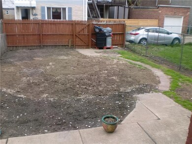Back yard faces Locarna Way, large enough to house