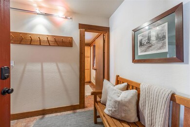 Welcoming foyer offers area for shedding coats and