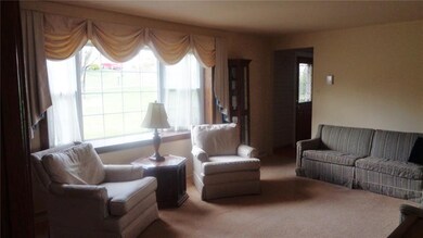LIVING ROOM, SHOWING LARGE PICTURE WINDOW