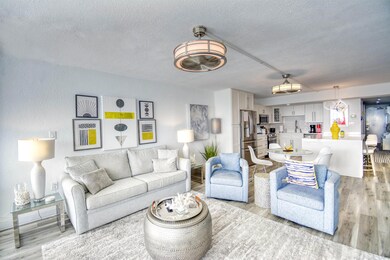 Living room featuring a textured ceiling and light