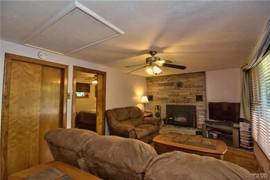 The living room is spacious for large furniture.