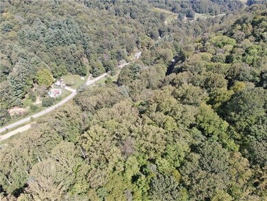 Top view center of property and to the right acros