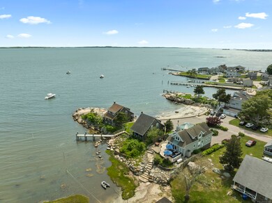 Direct Waterfront with Approved 4'x70' Dock. Nestled on .23 Acres