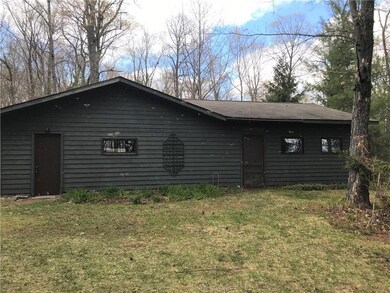 side view of garage and heated workshop entrance