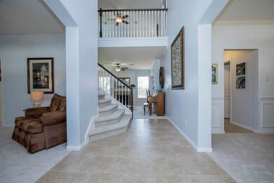 The Entry open into the Study, Dining Room and Family Room