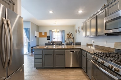 Kitchen with appliances with stainless steel finis